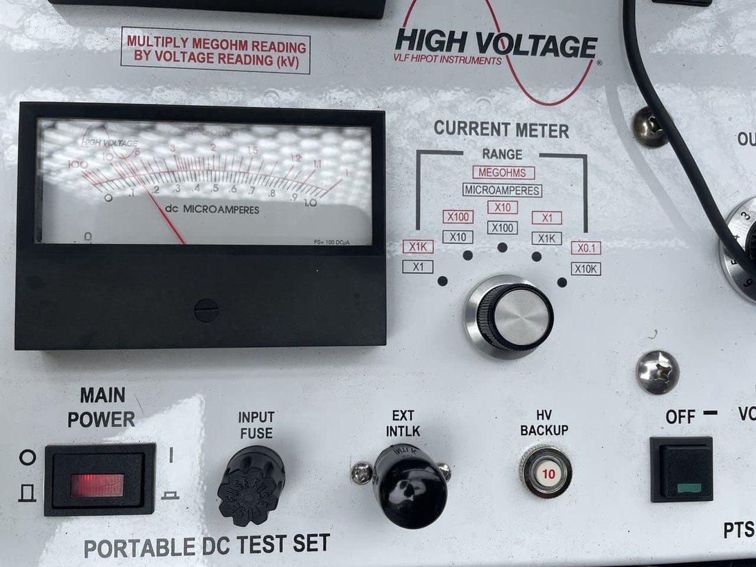 K1 Electric field technician performing acceptance testing